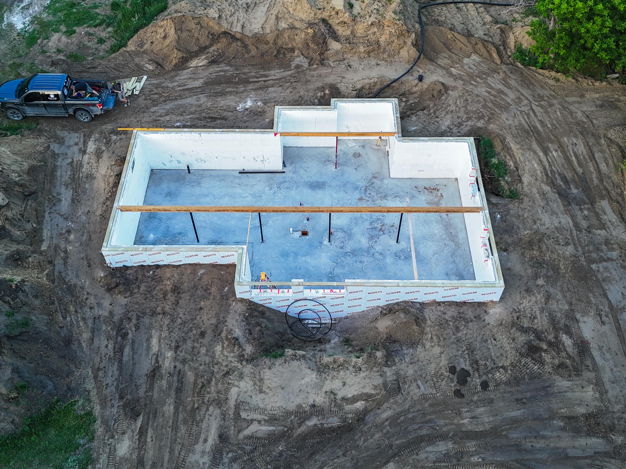 Finished concrete basement slab inside an ICF foundation