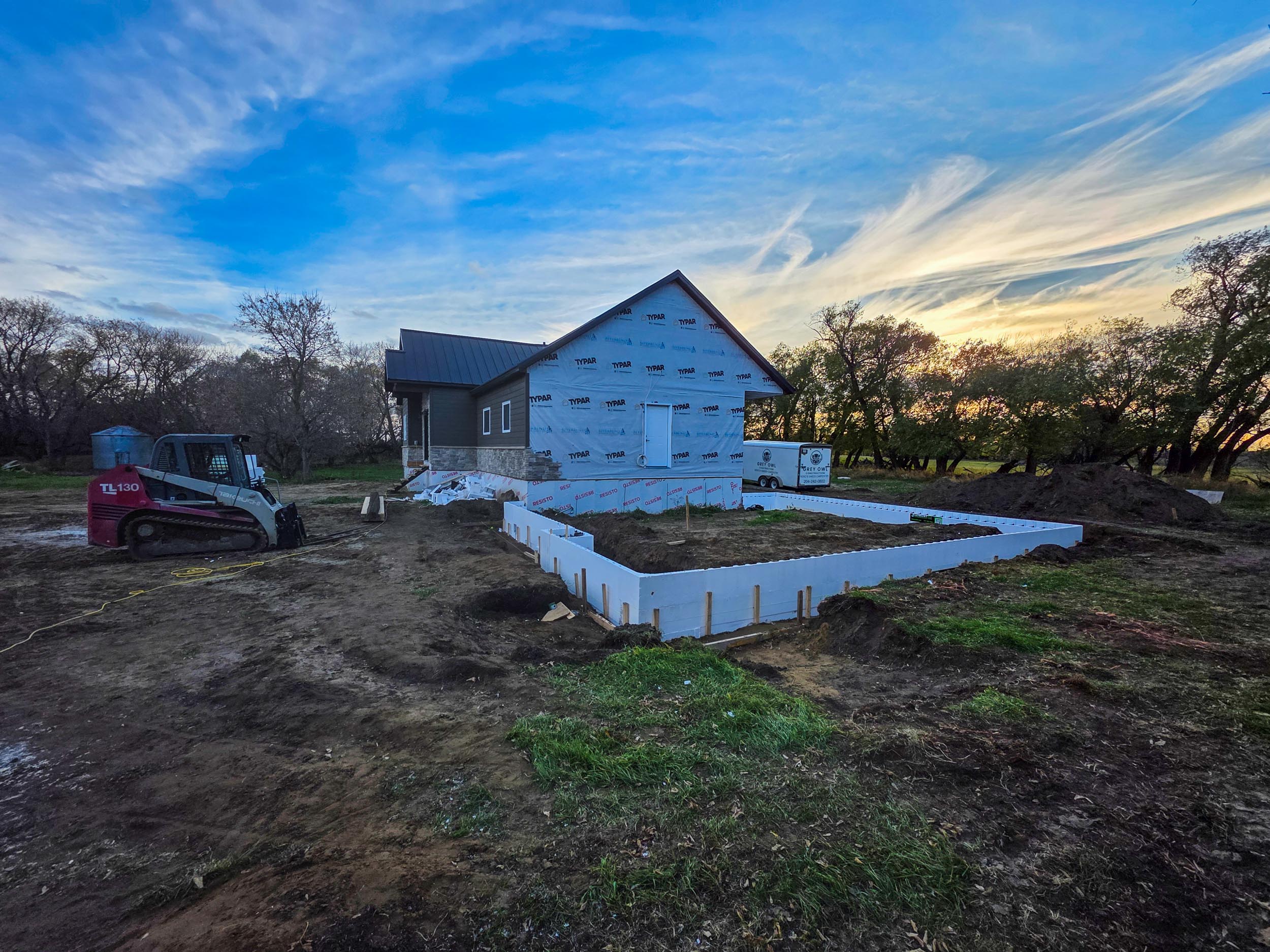Foundation preparation for a garage addition near Notre-Dame-de-Lourdes